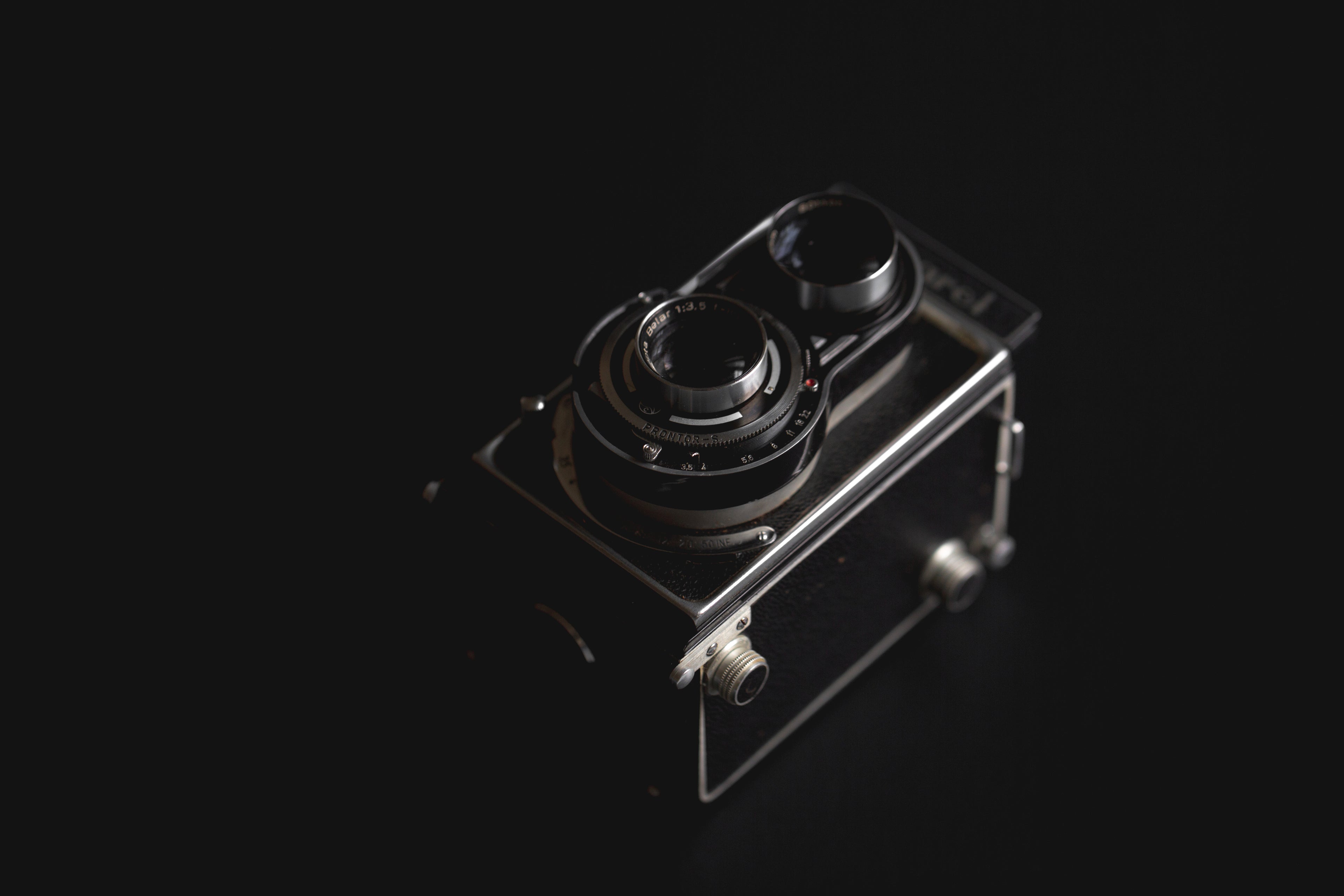 vintage-camera-against-black