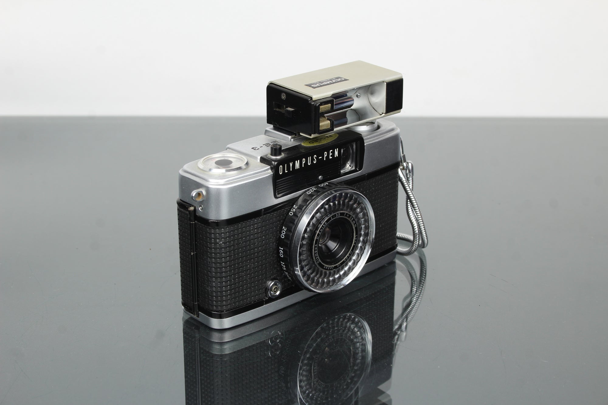 Olympus pen EE-3 Puolikehys