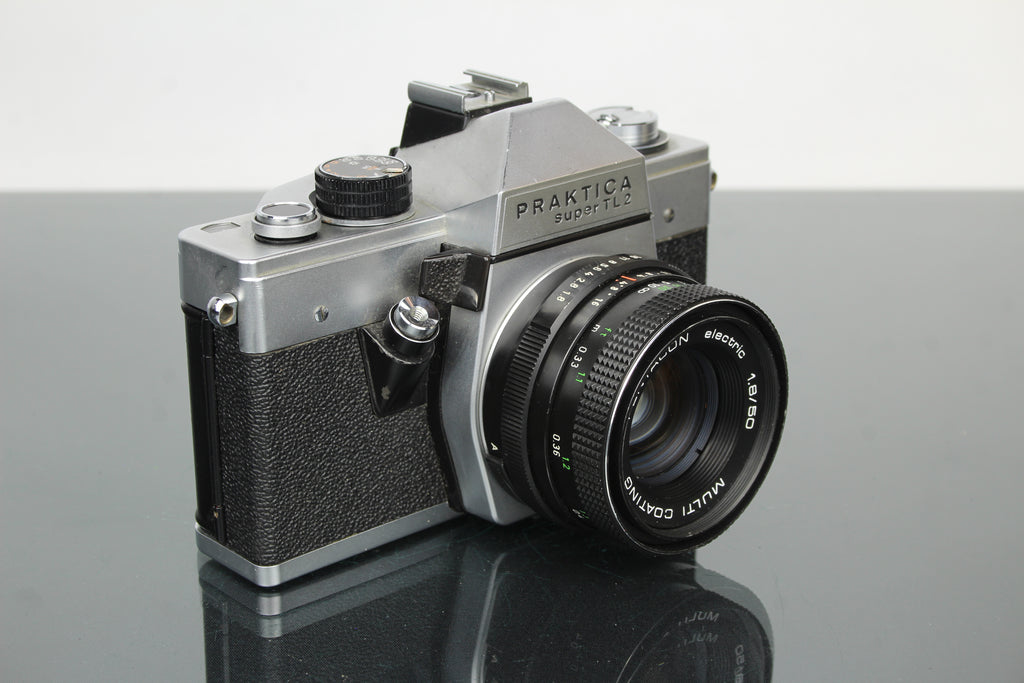 <tc>Praktica</tc> super TL2 + Pentacon sähköinen 50mm 1.8 M42 objektiivi