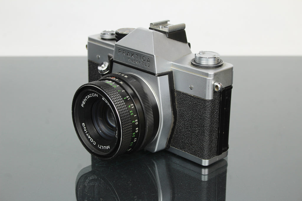 <tc>Praktica</tc> super TL2 + Pentacon sähköinen 50mm 1.8 M42 objektiivi