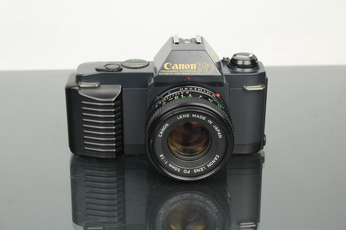 Canon T50 + 50mm 1.8 FD lens - Dutch|Thrift